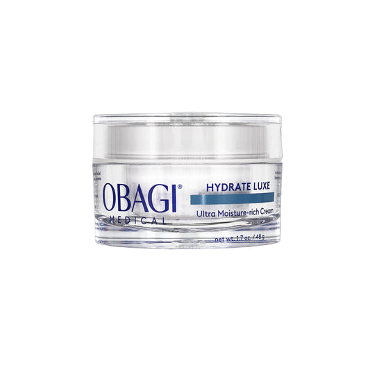 Obagi Hydrate Luxe cream jar on a gray background