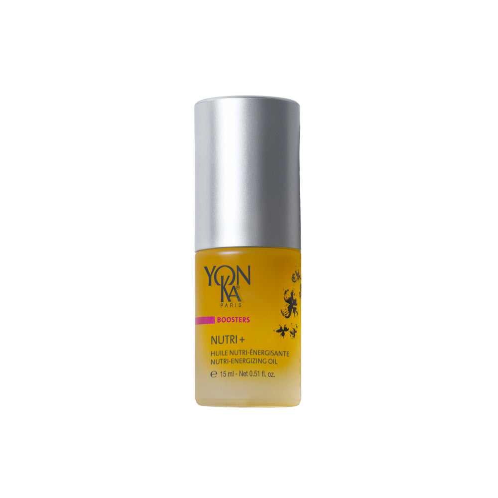 Yellow bottle with silver cap on a white background