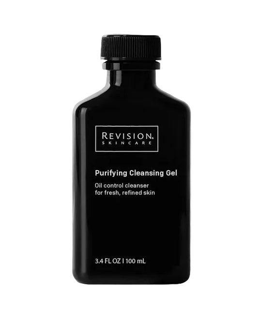 Black bottle of Revision Skincare Purifying Cleansing Gel on a gray background
